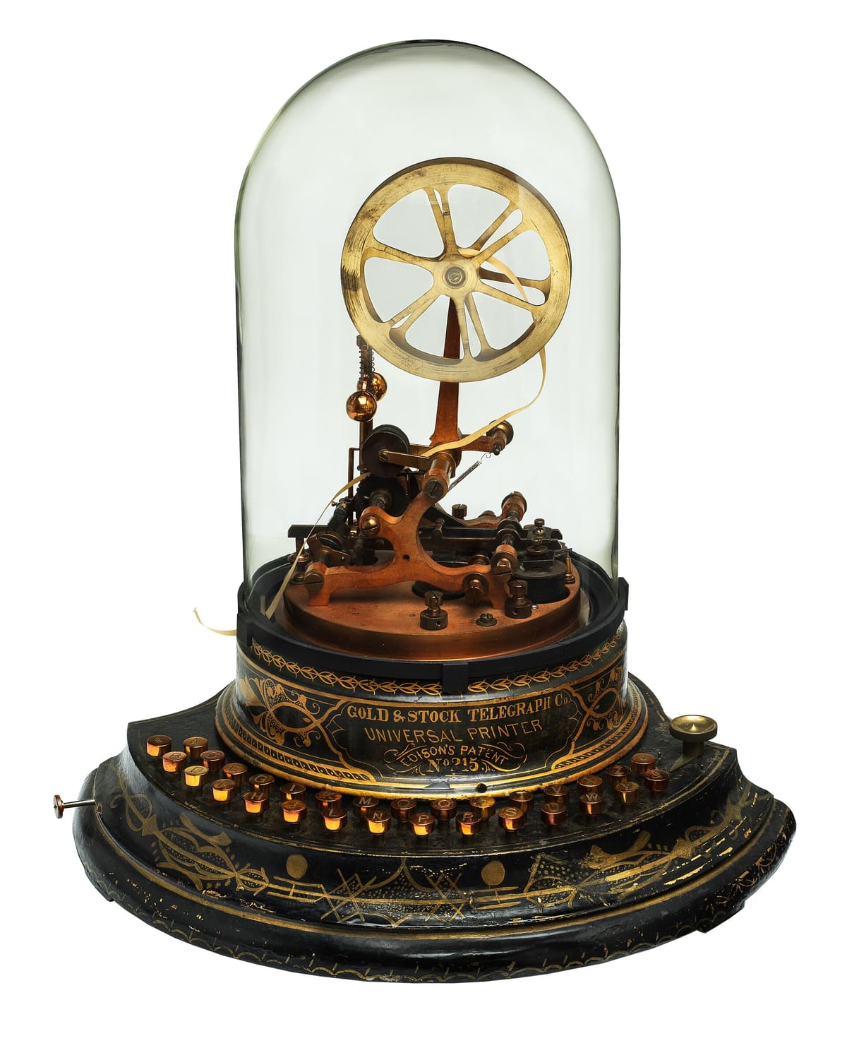 An Edison Universal Printer stock ticker for the Gold and Stock Telegraph Company: a brass type wheel under a glass dome, on a black and gold base.